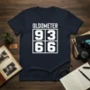 Navy blue t-shirt with white text "OLDOMETER" above a square grid displaying "93" and "66" for the Oldometer 93 66