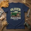 Oliver Farm King Since 1857 text with a vintage green tractor graphic on a navy blue t-shirt