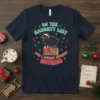 On The Naughty List And I Regret Nothing funny Christmas t-shirt with a black sheep graphic