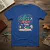 Once Upon A Time text with magical castle, moon, and unicorn graphic on a blue t-shirt