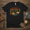 T-shirt design with text "ONE MONTH CAN'T HOLD OUR HISTORY" featuring pyramids, river, and an open book, surrounded by African