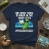 Navy t-shirt with white text "ONE MORE THING TO WRAP IN THE QUAD CITIES #PICKLEGATE2021" and a cartoon pickle holding