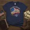One Nation Under God t-shirt with American flag, cow print bow, and fireworks graphic