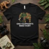 Black t-shirt with "ONLY ELEPHANTS NEED IVORY" text and a stylized elephant graphic in green and orange leaves