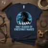 Dark blue t-shirt with "ONLY SCARED OF CHESTNUT MARES" text and a black horse graphic with white horses