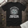 Black t-shirt featuring "Optical Illusion Eye Test Perception Is Not Reality" quote with an intricate eye design and geometric patterns