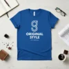Royal blue t-shirt with white 'G' logo and 'ORIGINAL STYLE EST. MMXX24' text