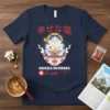 Osaka Buddha Spice Bowl Cat T-Shirt design featuring a happy cat eating ramen, with Japanese text above and "Spice Bowl