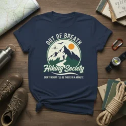 T-shirt with "Out of Breath Hiking Society" text and mountain graphic, featuring a hiker on a trail
