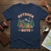 Outdoor Boys camping graphic t-shirt featuring a backpack, campfire, and mountains under a starry sky