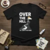Black t-shirt with "OVER THE HILL EST. [BIRTH YEAR HERE]" text, featuring a cyclist on a winding road up a