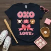 OXO LOVE baseball t-shirt design with pink typography, baseball, bat, glove, and bow graphics