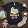 Pajama Day t-shirt with a cute sleeping sloth on the moon, surrounded by stars and clouds