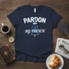 Navy t-shirt with white text "Pardon My French" featuring a blue Eiffel Tower graphic with mustache