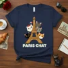 Paris Chat T-Shirt design with cute cats peeking around the Eiffel Tower. Features French flag and "PARIS CHAT" text