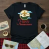 Paris Tennessee t-shirt design featuring a gold Fleur de Lis emblem, rolling hills, and clouds. The text "Paris Tennessee" is