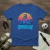 Parkour Flow Movement Unleashed T-Shirt featuring a silhouette of an athlete mid-jump over a cityscape at sunset