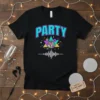 Black t-shirt with the word PARTY in turquoise and purple, surrounded by retro geometric shapes, a disco ball, and musical