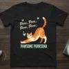 Orange tabby cat stretching with "Pawsome Purrsona" text on a black t-shirt