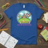 Peace Love School t-shirt design with tie-dye peace sign, heart, rainbow pencil, and schoolhouse graphic
