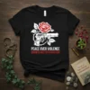Black t-shirt with white and red text 'Peace Over Violence Growth Not Destruction' and a graphic of a rose entwined