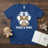 Peace & Paws t-shirt design with a cute cartoon puppy inside a paw print holding a peace sign, surrounded by