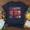 Pediatric Crew XO t-shirt with medical graphics and Valentine's Day theme, featuring the words "Pediatric crew XO" and icons like