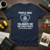 Navy t-shirt with white text "PEOPLE WHO TOLERATE ME ON A DAILY BASIS -THEY'RE THE REAL HEROES-" and a shield