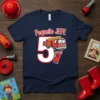 Navy blue t-shirt with "Pequeño JEFE 5" and a cartoon fire truck and extinguisher graphic for a firefighter birthday theme
