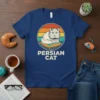 Vintage Persian Cat t-shirt with retro sunset graphic and fluffy white cat sitting on a pillow