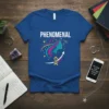 Blue t-shirt with the word PHENOMENAL in white text and a graphic of a woman's profile with flowing hair and