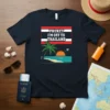 Phuket I'm Off To Thailand text with a tropical beach scene graphic on a navy t-shirt