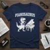Pianosaurus t-shirt design with a white cartoon T-Rex wearing a hat and playing a grand piano