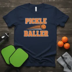 Pickle Baller text with a pickleball graphic on a navy t-shirt, perfect for pickleball players
