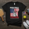 Pickleball and Freedom t-shirt design featuring Statue of Liberty, American flag, and pickleball paddle