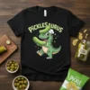 Picklesaurus text above a cartoon green dinosaur holding pickles, wearing a chef hat