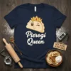 Pierogi Queen t-shirt design with a cute pierogi character wearing a crown and the text "Pierogi Queen" in elegant script