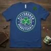 Pittsburgh Pennsylvania t-shirt design with a green shamrock and bridge graphic in a circular emblem