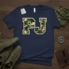 Navy t-shirt with large camouflage "PJ" initials in athletic font, outlined in beige