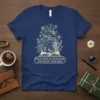 Plant Seeds of Knowledge And Watch Them Grow quote on a navy t-shirt with a stack of books and floral