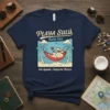 Playa Sulú Fiesta Time t-shirt featuring a man relaxing in a hammock between palm trees at Isla Aguada, Campeche Mexico