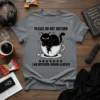 Black cat sitting in a cracked coffee cup with text "Please Do Not Disturb I Am Disturbed Enough Already" on