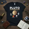 Black t-shirt with "PLUTO FOUND NEW FRIENDS" text and a graphic of Pluto surrounded by Ceres, Makemake, Eris, and Haumea