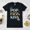 Pop Fizz Kiss text design with champagne glasses and lips graphic, light blue and gold colors