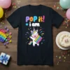 Pop It! I Am unicorn birthday t-shirt design with a unicorn holding a pop-it toy and colorful confetti