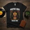 Positive Vibes Reggae Soul t-shirt featuring a Black woman with dreadlocks, sunglasses, and musical notes