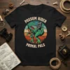 Possum Rider Primal Pals text on a black t-shirt with a retro graphic of a green dinosaur carrying a possum