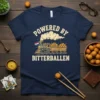 Navy t-shirt with "POWERED BY BITTERBALLEN" text and a cartoon train loaded with bitterballen, featuring a Dutch flag