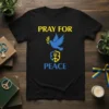 Black t-shirt with "PRAY FOR PEACE" text, blue dove, and Ukrainian trident emblem in yellow and blue