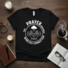 Black t-shirt with white text and graphic: Prayer The Original Wireless Connection, featuring praying hands and a cross